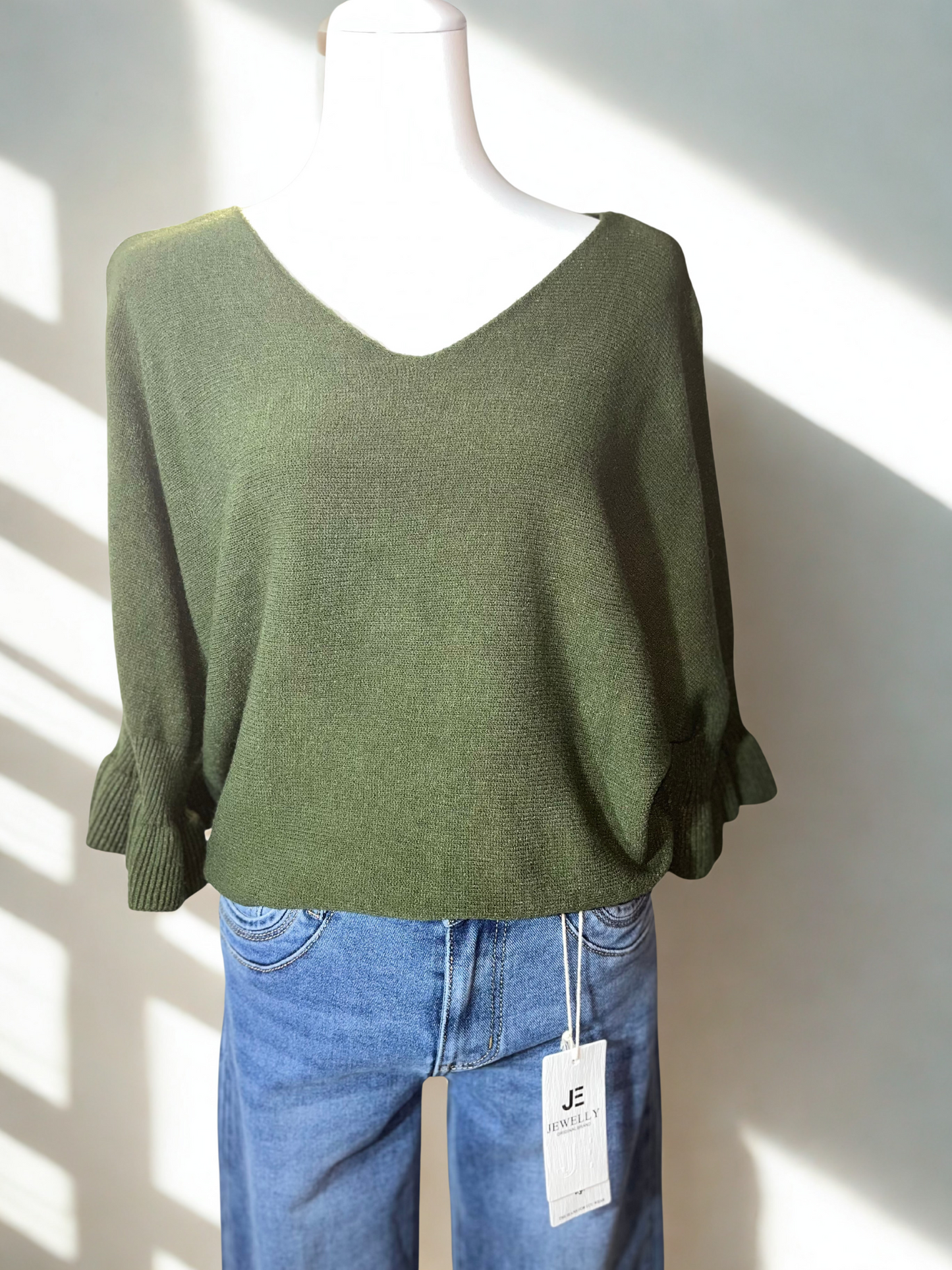 Pullover mit Wellenarm